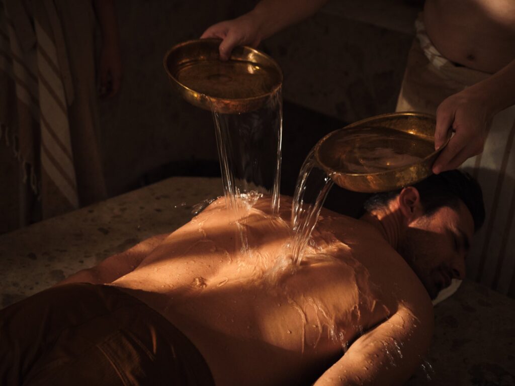 Traditional hammam water ritual at Pietra Calda Spa